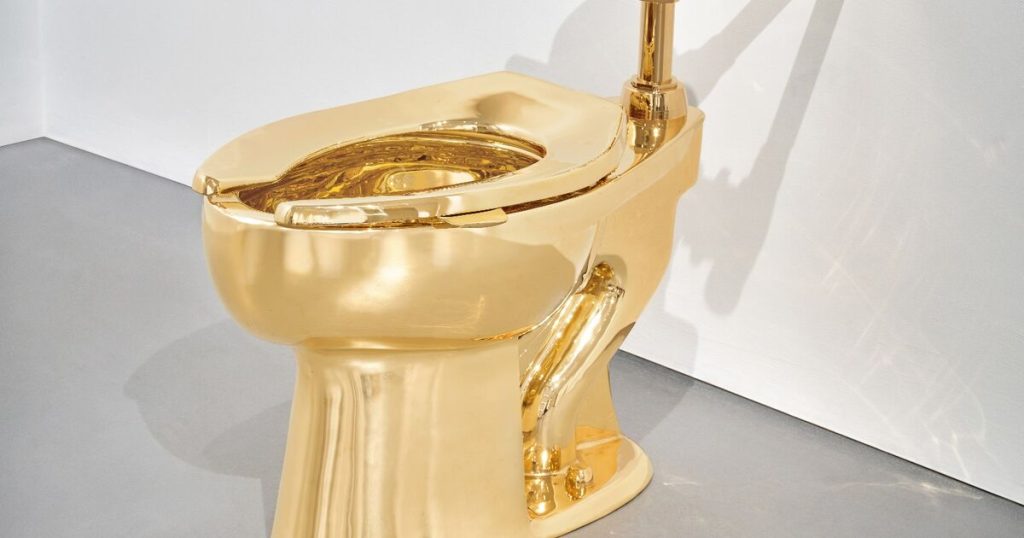 Maurizio Cattelan’s gold toilet heads to Sotheby’s.