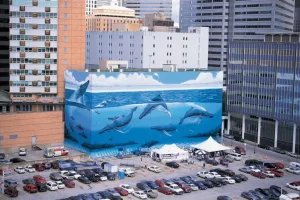 Artist Outraged After His Conservationist Mural in Dallas Is Painted Over to Allow for FIFA Promo