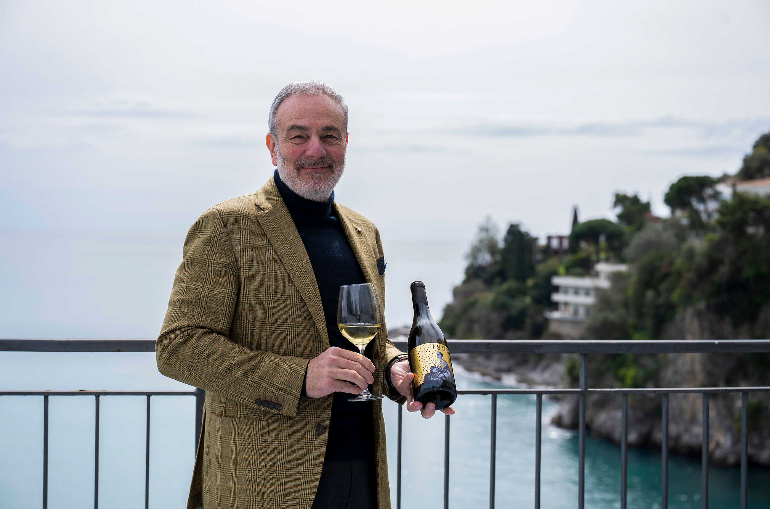 Roberto di Meo holding 1993 Fiano wine bottle March 2026
