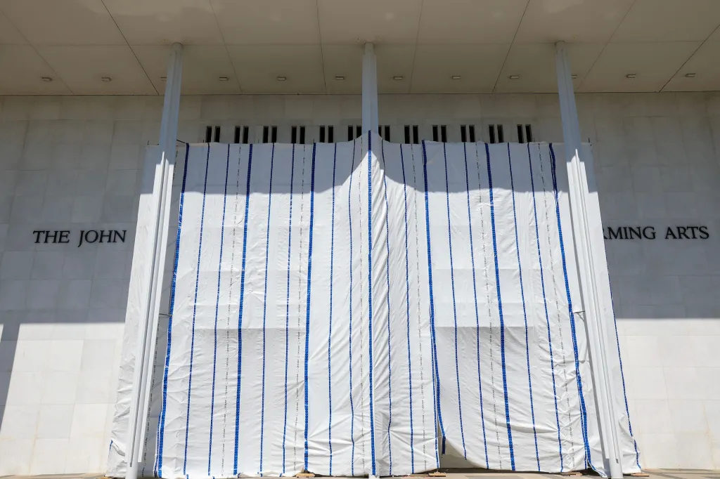 Trump’s Name Is Off the Kennedy Center. Why Is the Facade Still Covered with a Tarp?