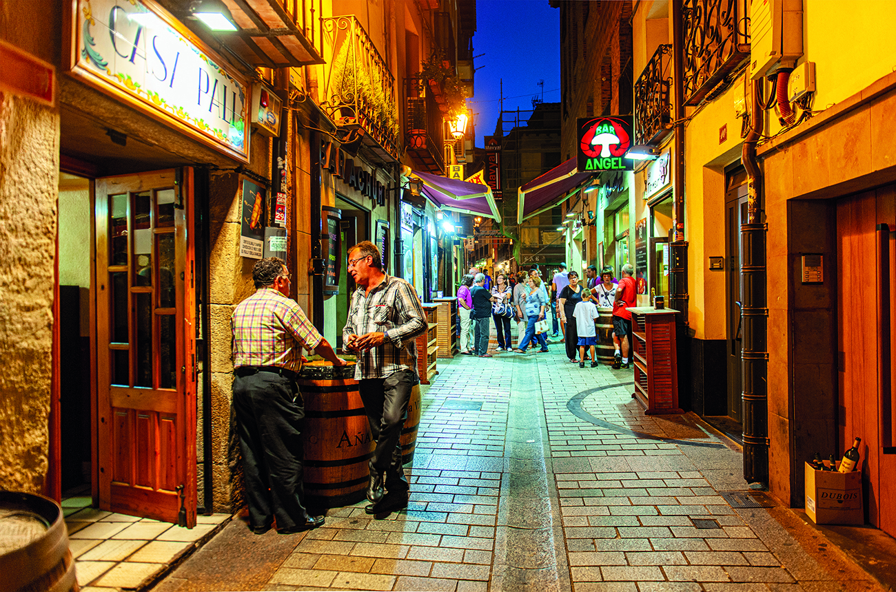Spain, La Rioja, La Rioja region, Logroño, September 30, 2011, several people along Calle Laurel at night for dining in tapas bar