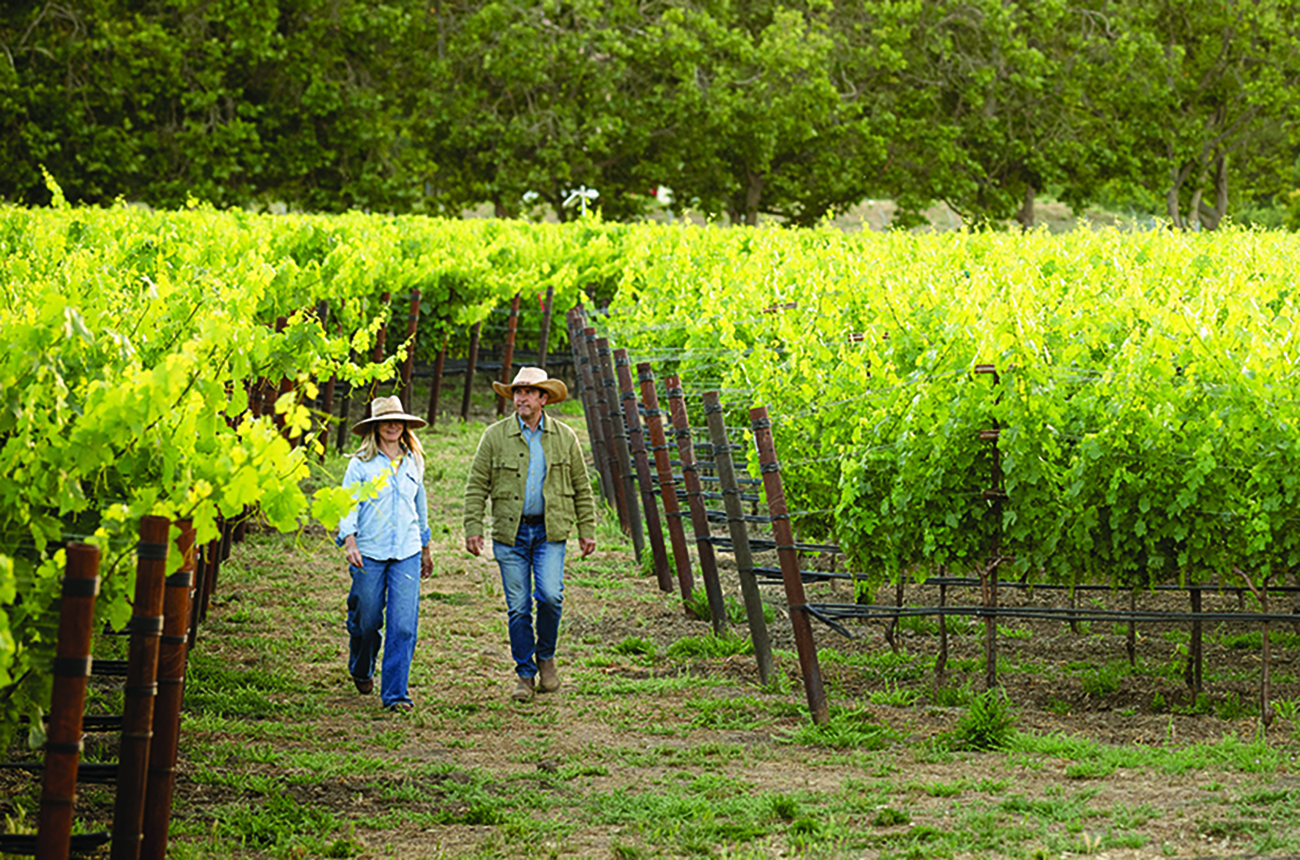 Annie Favia and Andy Erickson of Favia Wines in their organic vineyards in Oakville